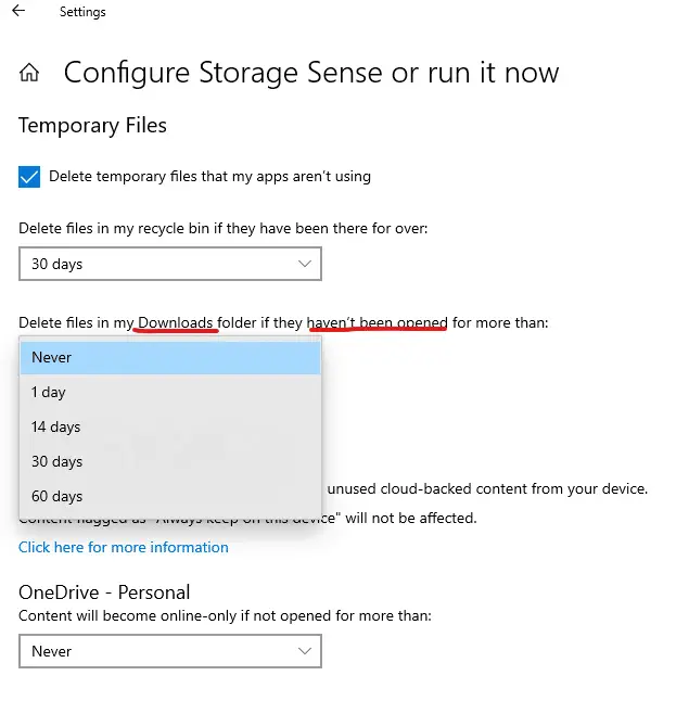 Windows 10 Settings App where we are on the Configure Storage Sense or run it now. We are looking at the settings for automatically deleting the Downloads folder items when they have not been opened for a specific number of days. In this case, we can see the options of Never, 1 day, 14 days, 30 days, and 60 days.