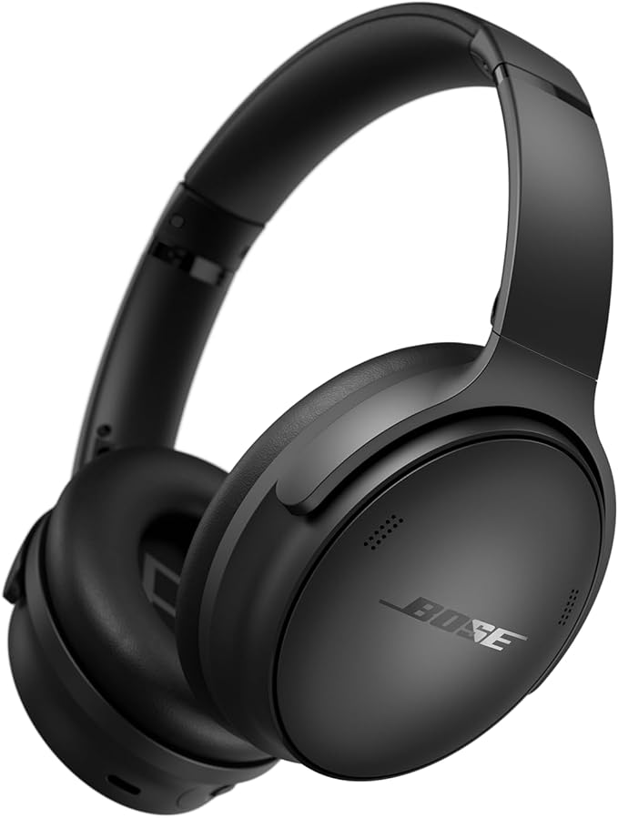 white background. black headphones.